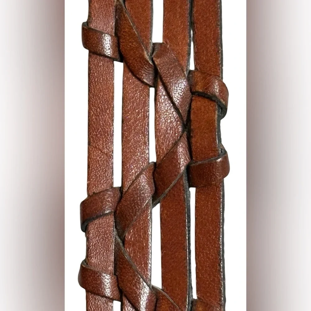A men’s / women’s leather braided belt, Made in Uraguay. M.